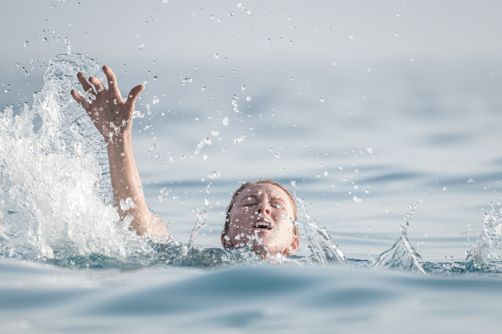 A woman drowning.